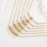 Arianna Horizontal Bar Pendant with Engraved Beads